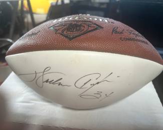 Sign Wilson, football by Walter Payton. No COA but the signature looks very good! Judge for yourself.