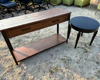 A two-drawer hallway table or a console table. Nice round end table to be placed between two of your elegant chairs or on one side of your chair.