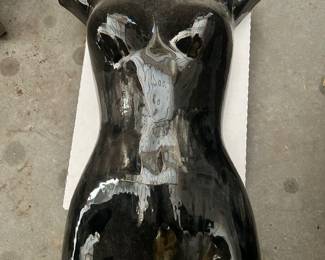 Black female half body mannequin torso. Has holes in the back to be a wall hanger. Weighs around10 pounds…