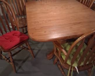 Pristine...excellent condition. a Amish made oak table with six chairs.  I believe it is about 72 inches long with the 2 leaves. Absolutely perfect for family gatherings.  Of course, the leaves can be taken out and the table is then much smaller..  it is really beautiful