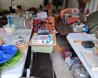 Very old school desk, various wreath and wreath holder. Some beautiful platters.  A new rechargeable pole saw. Very long extention cords  xmas stuff Etc...