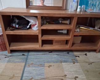 Pristine condition, Open credenza  would be great for any storage needs. We used it for puzzles and games and things like that
