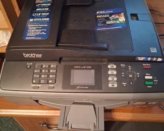 Brother printer in very good condition also comes with a large amount of extra ink cartridges.  Printing paper and photo paper available