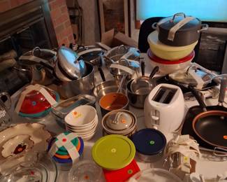Lots of pots and pants in excellent conditions with lids. Also many other kitchen accessories in very good condition like toaster, bowls, mixer. Coffee maker, Etc