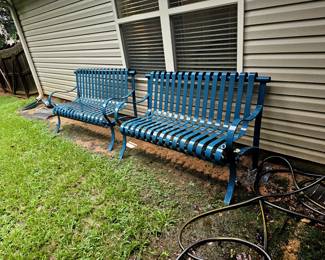 Solid steel benches from outside an old library. 