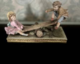 Porcelain Capodimonte figurine
Mid 20th century
13 inches wide
9 inches tallest side