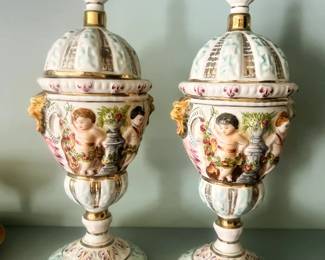 Pair of Capodimonte lidded urns.
13in tall