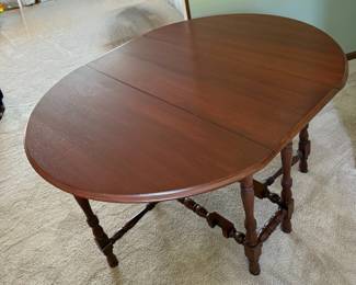 small drop side table with glass top.  $75