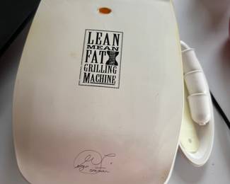George Foreman with tray and plastic feet.  $5