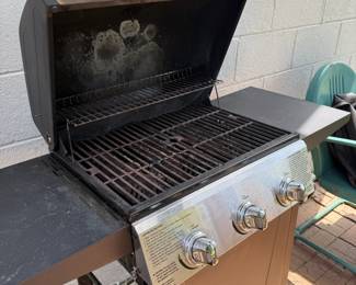 Grill with cover $60 does include propane tank. 