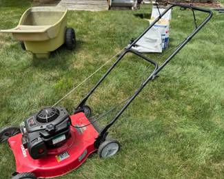 Lawn mower.    Needs spark plug $40
