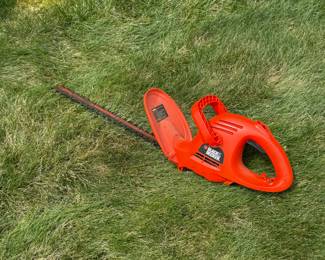 Black and Decker Hedge trimmer.  Uses an extension cord to plug in $15