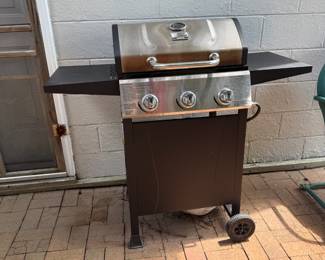 Grill with cover $60 does include propane tank. 