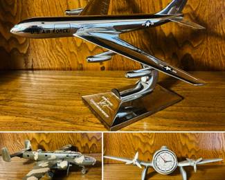 Vintage airplane model displays including: a Boeing KC-135 Stratotanker, North American B-25 Mitchell bomber aircraft, and a Sarsaparilla Airplane Desk Clock. 