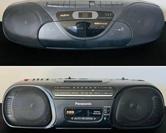 A Sanyo boombox with "BASSXPANDER" and "CD SYNCHRO DUBBING" and Panasonic RX-FS430 Stereo Radio Cassette Recorder