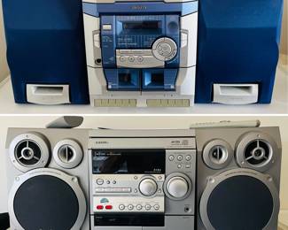 Aiwa NSX-AJ100 audio system and an Aiwa NSX-R20 stereo system.