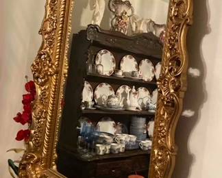 Mirrors with gold leaf frames in various sizes