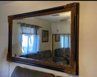 Large wall mirror with solid framing 