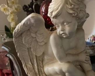 Charming cherub statue 