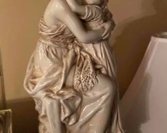 Porcelain statue with mother and child