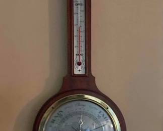 Vintage wood and metal barometer