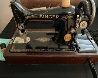 Singer 99k model. Made in 1929 in Kilbowie Scotland. Pristine condition but needs new wiring or a new belt to use. 