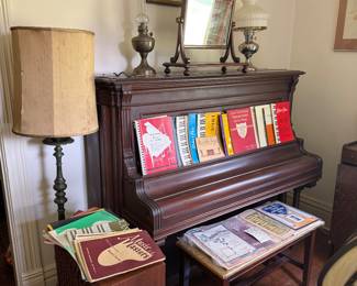 Piano and vintage music books/paper