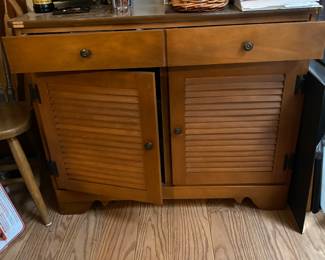 Louvered doors cabinent MCM for sure