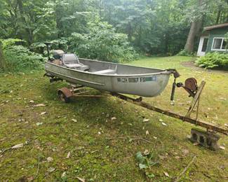 fishing boat , motor and trailer