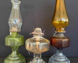 Trio of Vintage Kerosene Lamps A Collection of Illuminating History