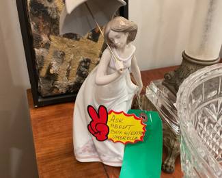 Lladro girl with umbrella $120 + tax