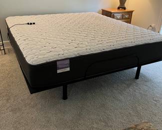 Like new King size adjustable bed with frame