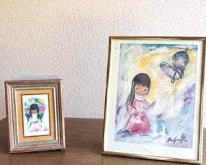 Framed DeGrazia Art Prints of a Young Girl with Bell and Flower Bouquet