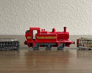 Various vintage miniature toy and decorative trains