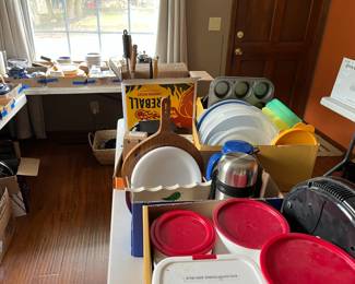 Tupperware, baking sheets, kitchen utensils