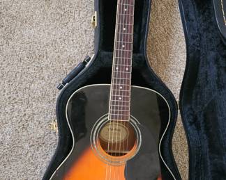 Mitchell guitar and case