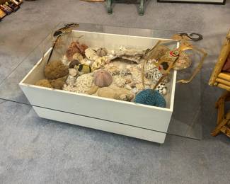 Glass top enclosed beach table with sand and shells
