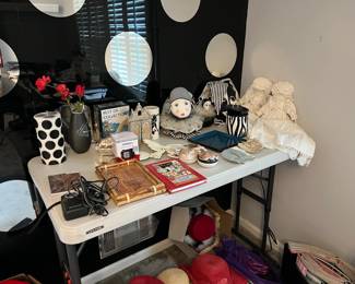 Assorted decor, dolls, and beauty supplies