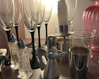 Angel candle holder, champagne flutes, and salt and pepper shakers