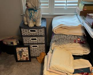 Storage cabinet, blankets and sheets