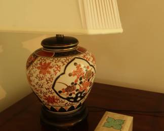 one of two asian style lamps with silk shades