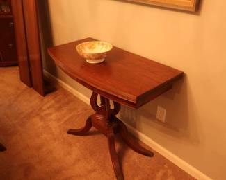 $ 250.00 Flip top table- Duncan Pfyfe with harp design. It is 36" across x 18" deep.