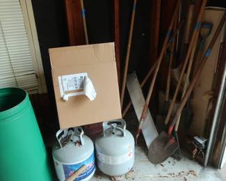 yard tools in garage