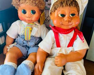pair of handmade dolls by Naber Gastalt with tags