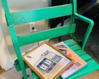 besides the COA the stadium seat comes with additional park memorabilia