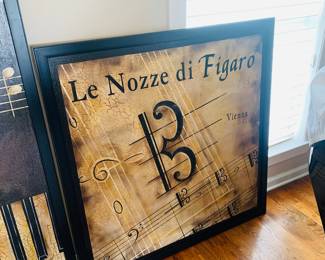 large framed canvas that features music