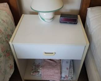 Nightstand; table lamp