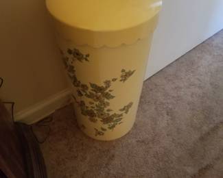 Tall plastic laundry container with lid