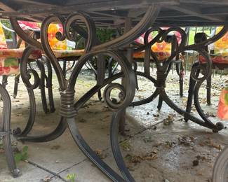 wrought iron outdoor dining table with marble top 