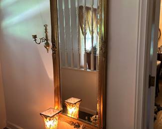 Entry way mirror and marble table. 